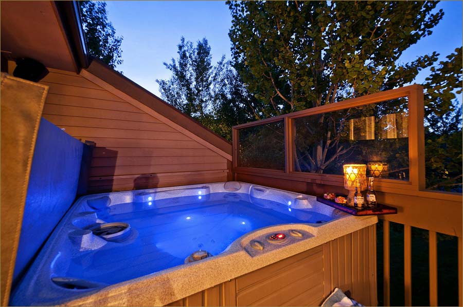 Bubbling private hot tub under the stars.