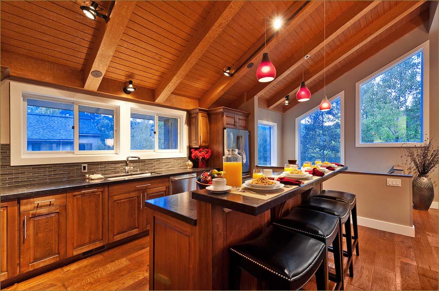 Granite countertops and warm wooden floors this kitchen is open to the great room and all the fun family goings on.