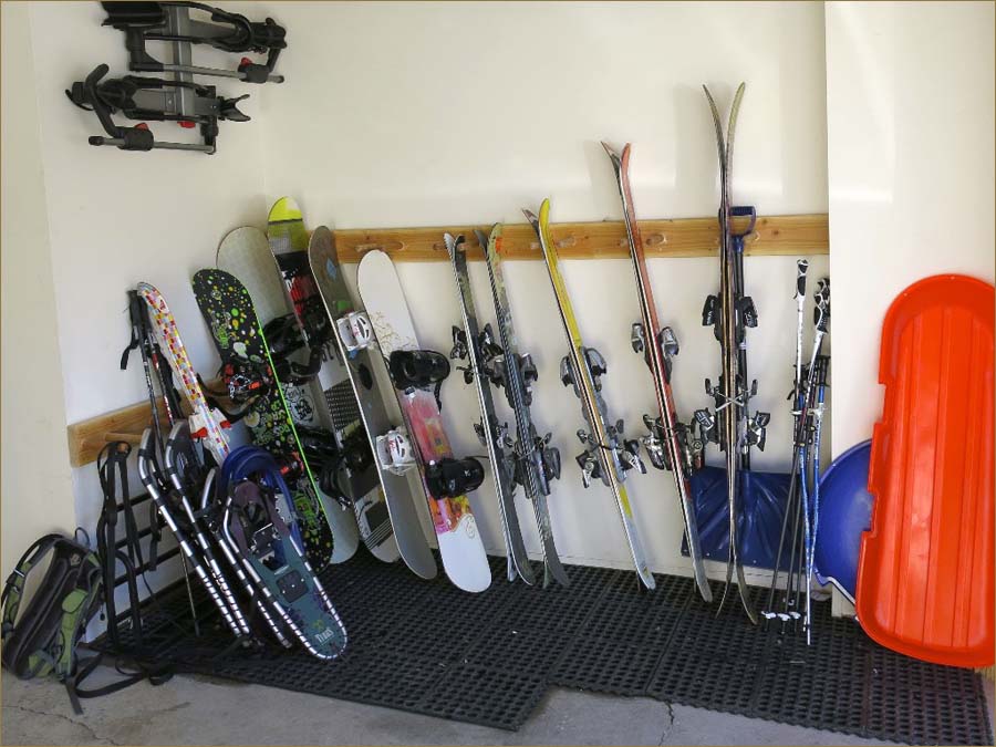 Heated garage with ski, board and gear storage.