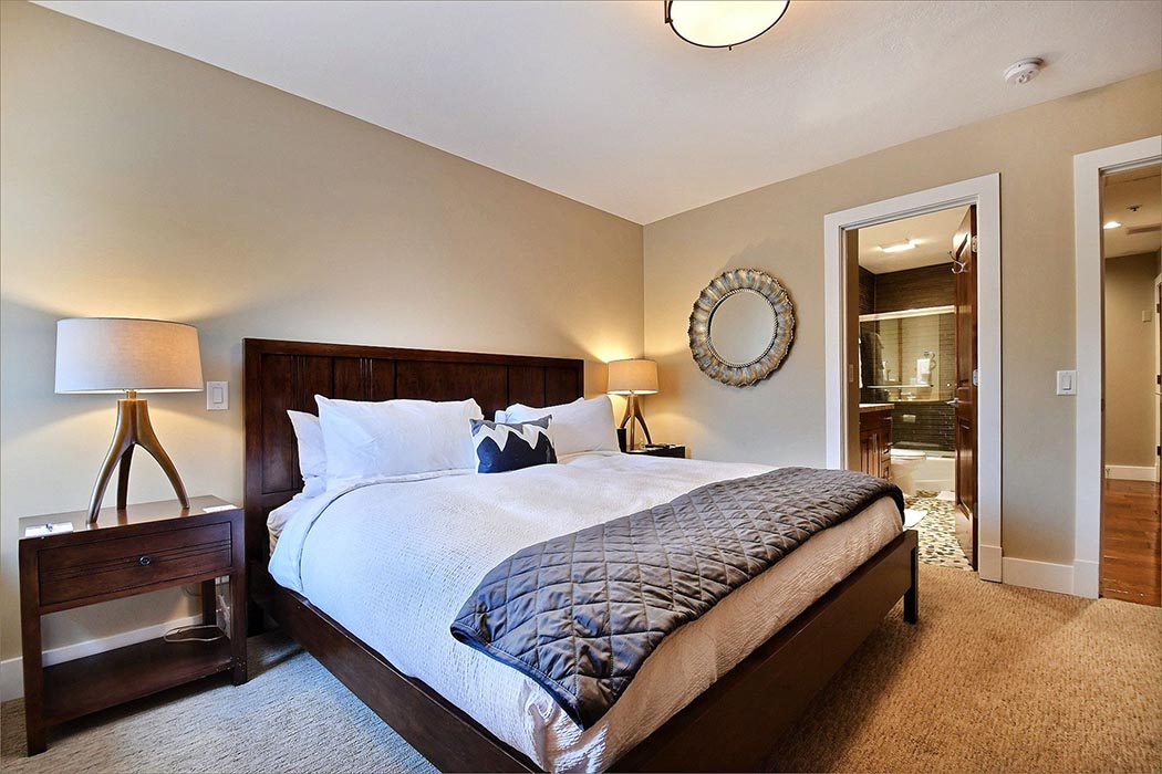 Master guestroom with king bed and private attached bathroom.