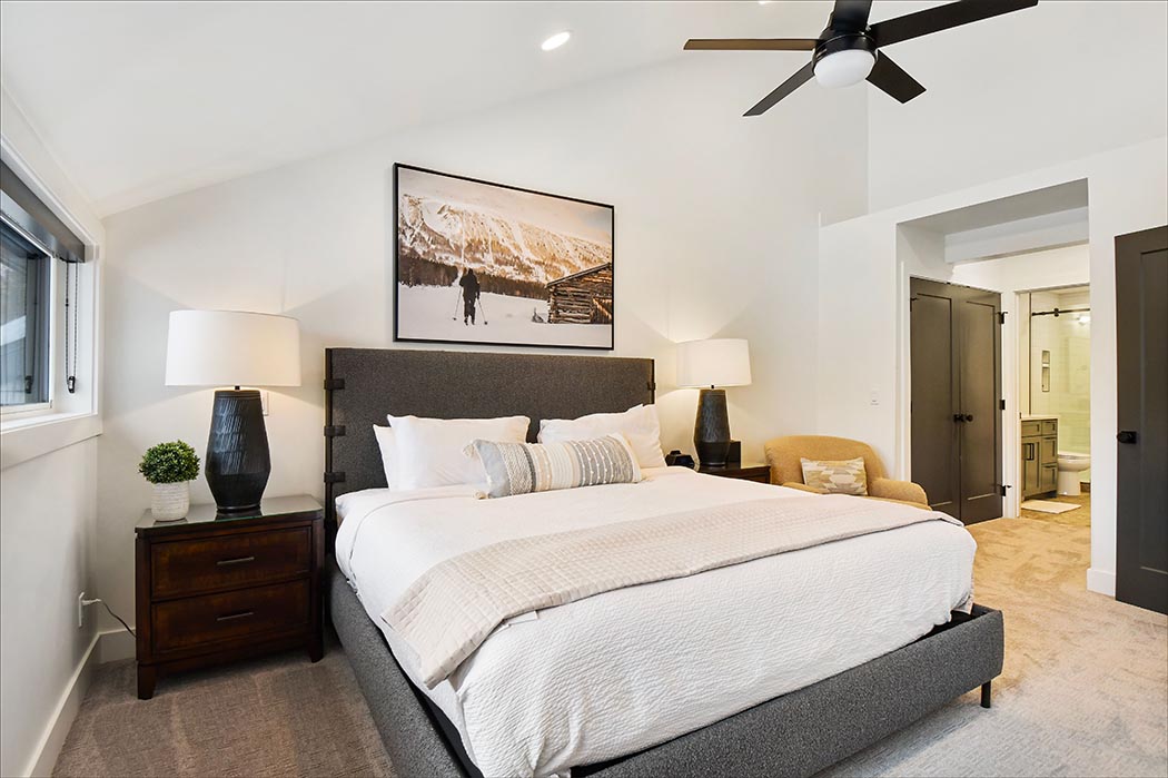 Situated on the top Level this master bedroom includes a queen sized bed and shared bathroom.