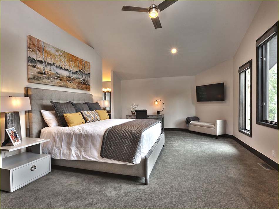 Large king sized master bedroom with views, large flatscreen TV, and en-suite bathroom