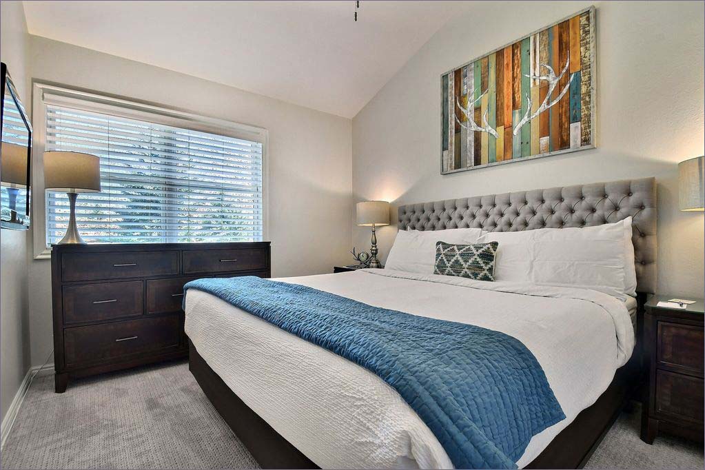 Master guestroom with king bed and private attached bathroom.