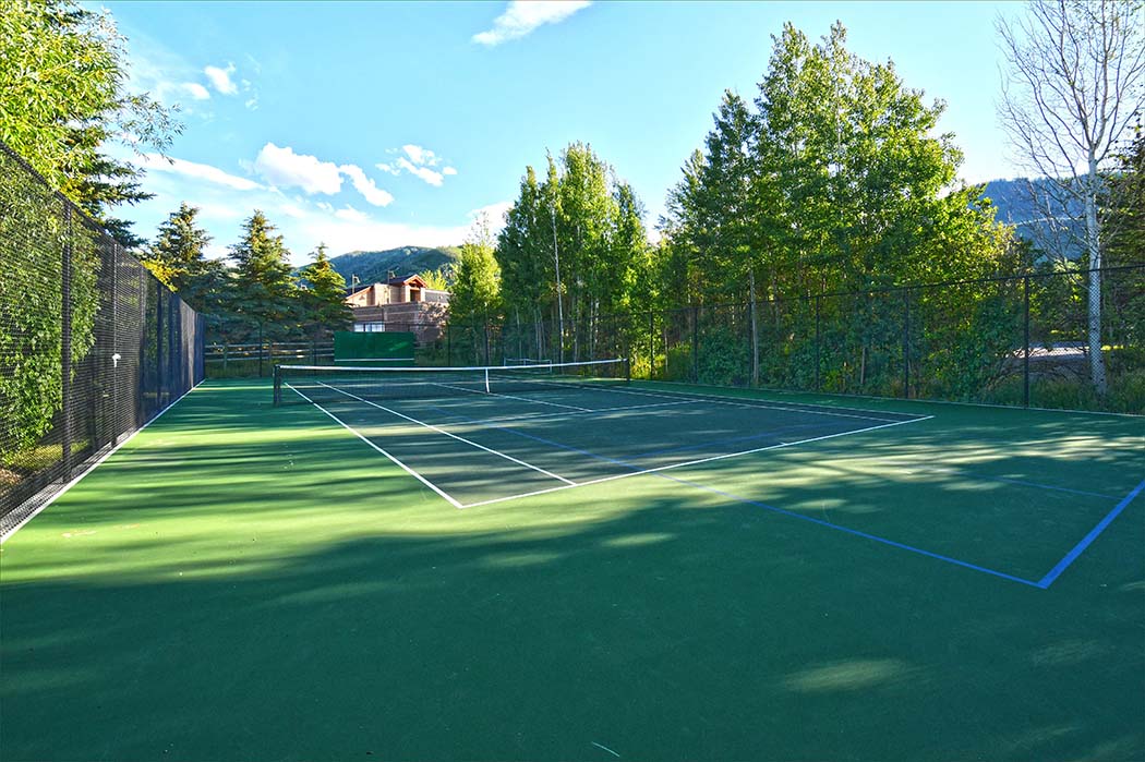 Quiet, restful setting along a year round, community tennis courts.
