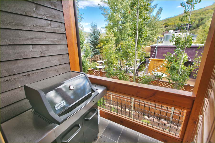 Stunning views from every vantage, this lovely vacation home in downtown includes an outdoor Weber grill.