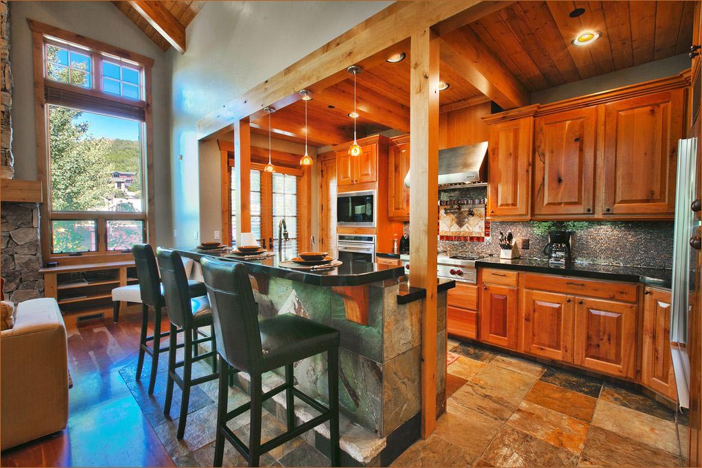Park City luxury gourmet kitchen with custom, countertops, appliances, cookware and servingware.