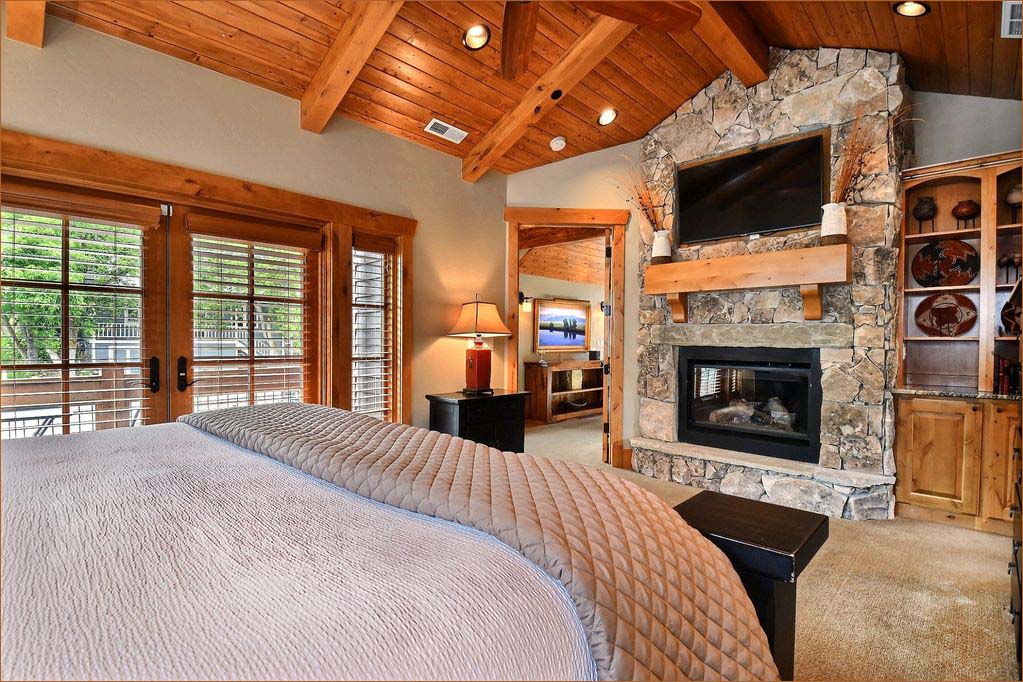 With an en suite fireplace, flat screen TV and king bed the the master suite is a private hideaway.
