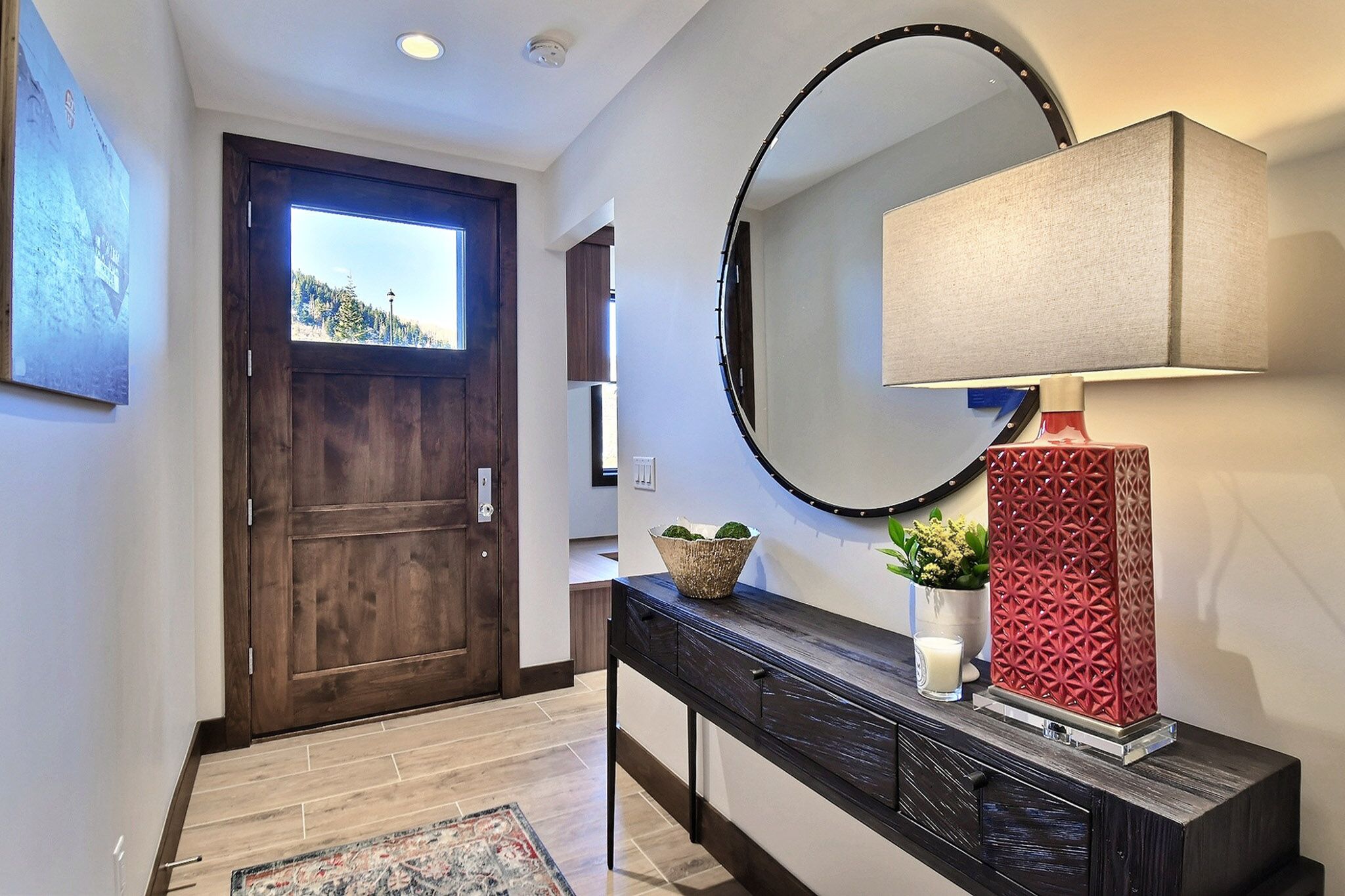 Step into the warm, radient, heated foyer and onto the private elevator.