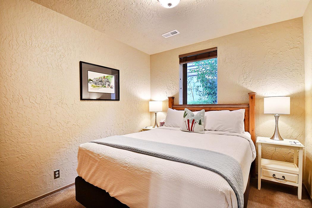 Our queen size guest suite, cozy and contemporary, with a shared bathroom. 