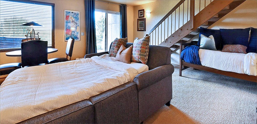A perfect place for the kids to hang out the lower level den is equipped with a sleeper sofa, game table and large flat screen TV/DVD.